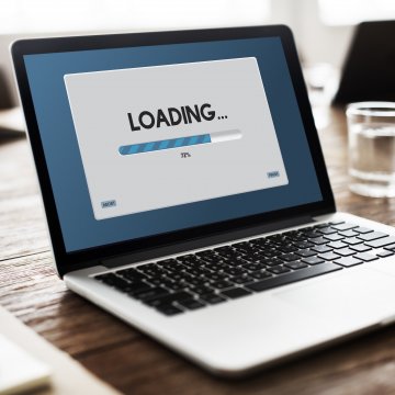 laptop with loading bar on the screen system optimizers 